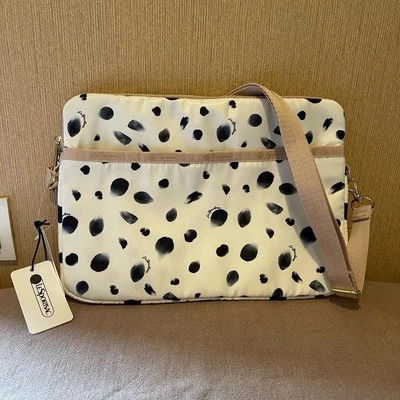 Bandolera a lunares Lesportsac manga para computadora portátil nueva con etiquetas Foto 1 de 4