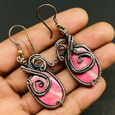 Pendientes artesanales envueltos en alambre de cobre con piedras preciosas de rodonita natural 41x18 mm Foto 1 de 4