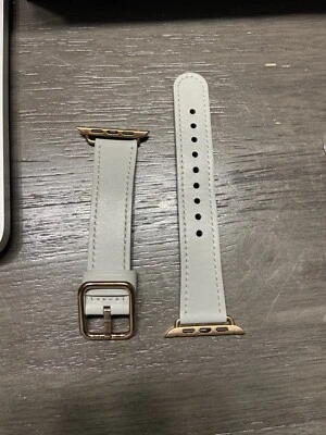 Correa de reloj Apple gris 42 mm, con detalles en oro rosa, usada una vez Foto 1 de 2
