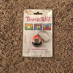 Bandai Tamagotchi 20th Anniversary Series 3 Black & Orange Virtual Pet New - Picture 1 of 2