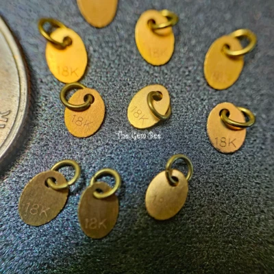 Dije de disco ovalado de oro amarillo de 18 k de 3,6 x 5 mm estampado hallazgo de etiqueta con anillo de salto de 3 mm 1/10 Foto 1 de 4