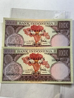 1959 Indonesia 100 Rupiah Lot of 2 Banknotes P# 69 - Image 1 of 4