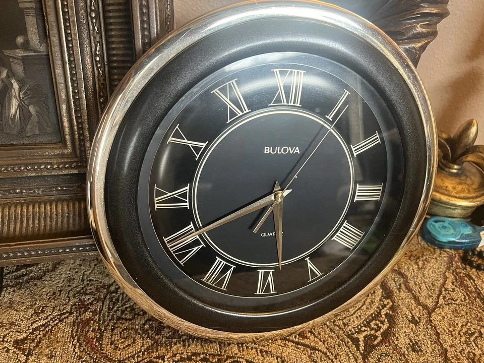 Vintage Bulova 11"round gold black Wall clock Roman numbers - Image 1 of 4