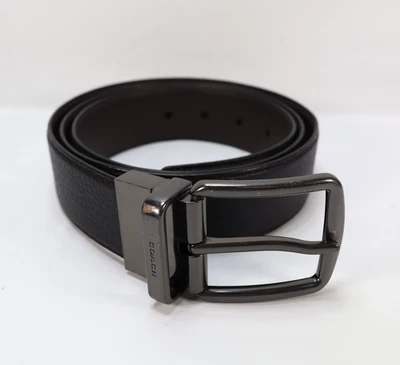 Cinturón reversible con hebilla y arnés COACH talla 42 cuero granulado negro liso marrón oscuro Foto 1 de 4