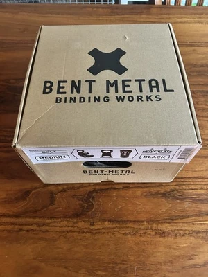 Fijaciones de snowboard de transferencia de metal doblado pequeñas Foto 1 de 4