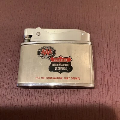 Encendedor plano de cigarrillos vintage AAA Auto Club Missouri Top Push sin usar Japón Foto 1 de 4