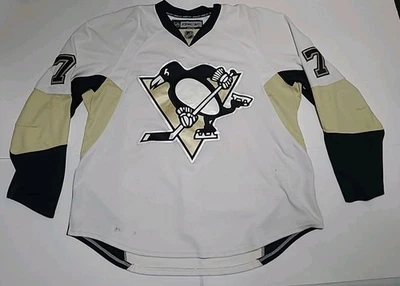 CAMISETA DE HOCKEY REEBOK EMITIDA POR EL EQUIPO AUTÉNTICO DE LOS PINGÜINOS DE PITTSBURGH 56 #7 Foto 1 de 4