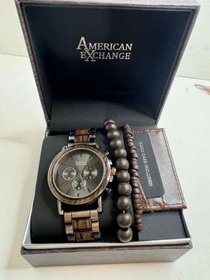 Armani Exchange Hombres Gunmetal Acero Inoxidable Grano Madera Reloj Portatarjetas Juego de Pulsera Foto 1 de 4