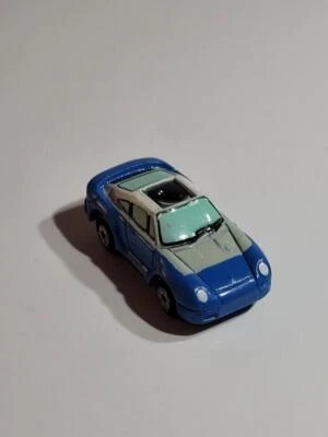 Спортивный автомобиль Galoob Micro Machines Private Eyes синий Porsche 959 1990 - Изображение 1 из 4
