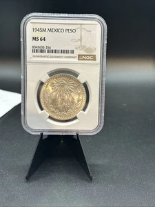 1945M Mexico Silver Un Peso - NGC MS 64-AMAZING LUSTER! - Picture 1 of 1
