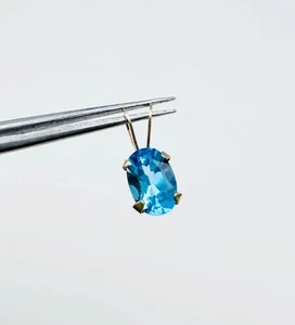Colgante pequeño de topacio azul corte ovalado Estate de oro amarillo de 14 quilates de 0,43 quilates (6x4 mm) - Imagen 1 de 18