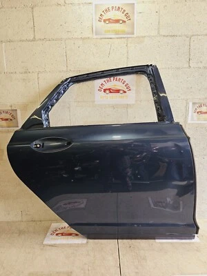 Lincoln MKZ 2013-2020 lado del pasajero trasero derecho panel de carcasa de puerta derecha fabricante de equipos originales usado  Foto 1 de 4