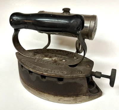 Antigua MÁQUINA DE GAS AMERICANA DE HIERRO TRISTE PLANA CO 11-5-1912 tope de puerta/decoración del hogar Foto 1 de 4