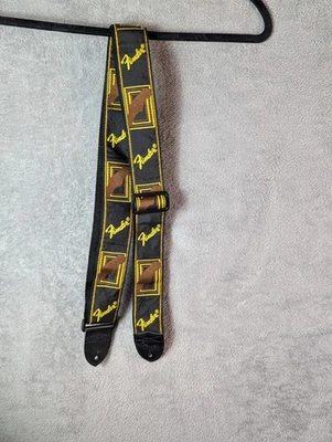 Correa de guitarra Fender Legacy monograma letras negras doradas nueva sin etiquetas Foto 1 de 4