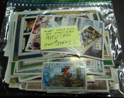2.2 OUNCES AITUTAKI STAMPS MINT MOSTLY COMPLETE SETS SCOTT CAT $594 ++ - Image 1 of 2