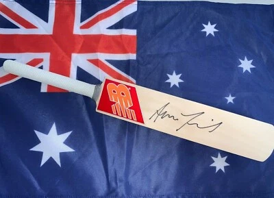 Aaron Finch (Australia) signed New Balance (Red/Orange) mini cricket bat + COA - image 1 of 3