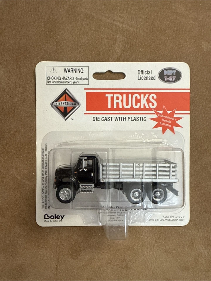 1:87 International 3-Axle Stake Bed Truck - Black & Silver - Boley #4006-36 - Image 1 of 1