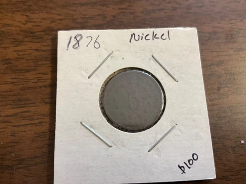 1876 Shield Nickel Darkened but with Good Details Cover