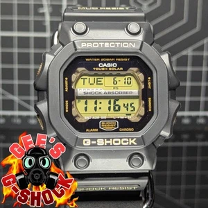 Casio G-Shock GX-56 7 LUCKY GODS Black Gold Khaki XL Square Fertility GX-56SLG-1 - Picture 1 of 12