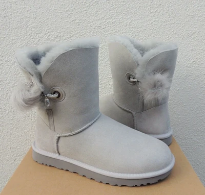 Botas UGG GRIS VIOLETA IRINA BLING BAILEY POM GAMUZA/PIEL DE OVEJA, EE. UU. 11/UE 42 ~ NUEVAS EN CAJA Foto 1 de 4