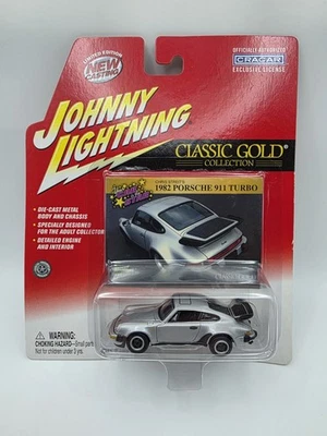 Johnny Lightning Classics Gold 1982 Porche 911 Turbo 2003 con neumáticos de goma Foto 1 de 4