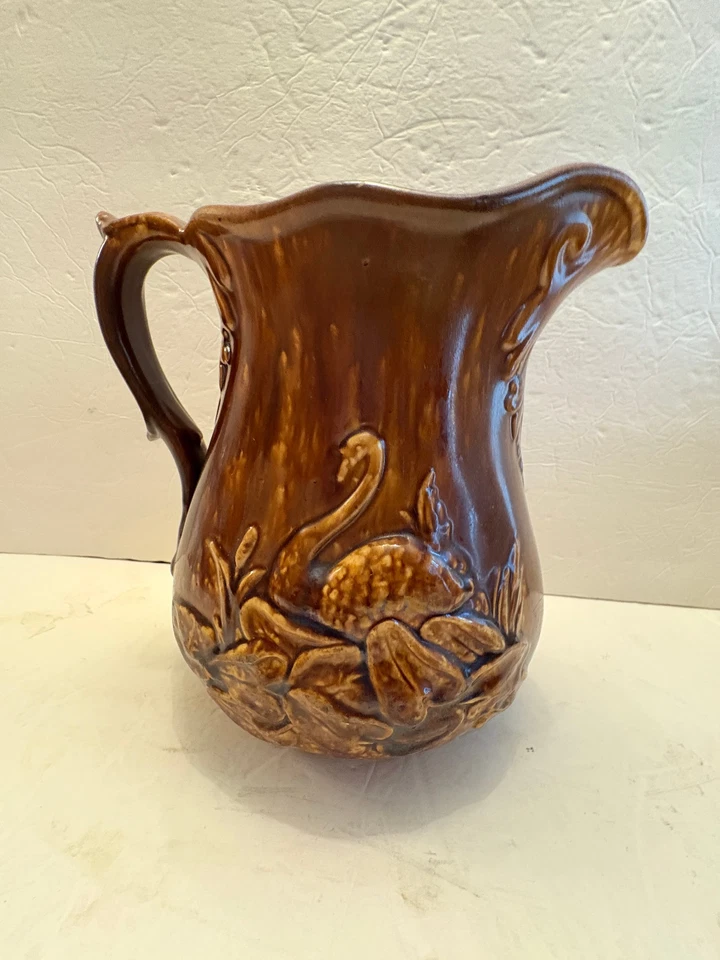 Bennington Rockingham Yellow Wear  Ale Pitcher Swan 9" TALL,, Brown Glaze - Image 1 of 4