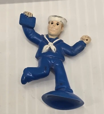 Blue Cracker Jack Boy Holding Cracker Jack Box Suction Cup Toy 2 Inch Rubber - Image 1 of 4