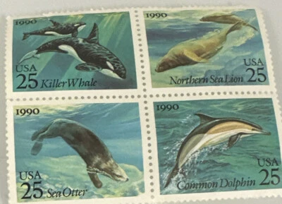 Estampillas de colección de ballena asesina, león marino del norte, nutria marina y delfín común Foto 1 de 3