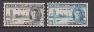 (F301-42) 1946 Turk & CAICOS Islands set of 2stamps KGVI Victory M/H (AQ)  - Picture 1 of 1