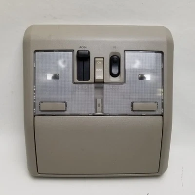 04 05 Nissan Máxima consola central superior domo mapa luz techo corredizo 2004 2005 Foto 1 de 4