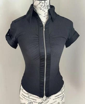 Blusa Bebe Negra con Cremallera y Mangas con Pestaña Enrollable Talla XXS Mezcla de Seda Foto 1 de 4