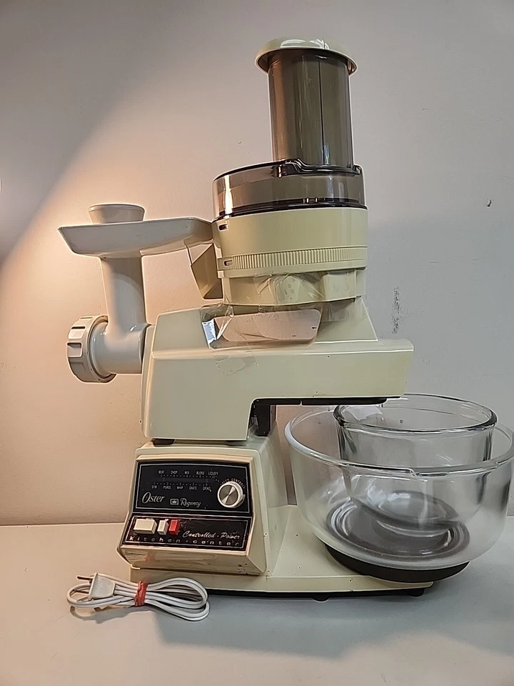 Centro de cocina Oster Regency - licuadora, batidora, molinillo, dougmaker, rebanadora Foto 1 de 4
