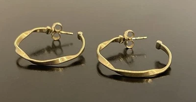 Pendientes de aro grandes retorcidos italianos Marco Bicego de oro amarillo macizo de 18 quilates Foto 1 de 4