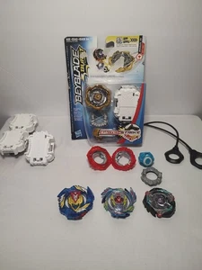 Beyblade Metall und Kunststoff Konvolut 4 Sammelfiguren. Eine neue im Paket! - Bild 1 von 3