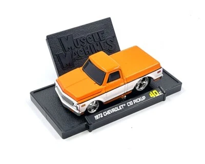 Muscle Machines 1:64 1972 Chevrolet C-10 Pick Up orange 15567OR - Image 1 of 2