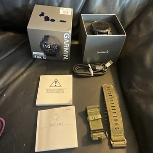 Garmin fēnix 7X Zaffiro Orologio GPS Solare - Nero con Scatola e Manuale e Cinturino Extra - Foto 1 di 6
