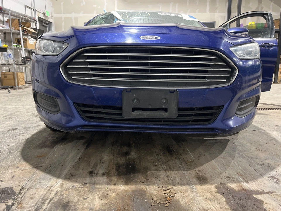 2013 - 2016 Ford Fusion Deep Impact Blue-J4 Front Bumper Foto 1 de 4