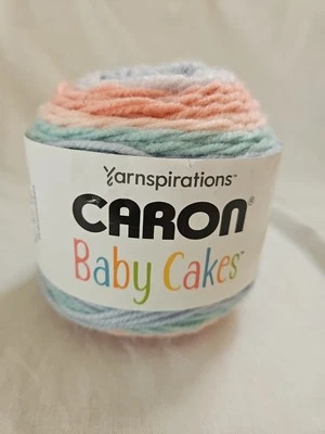 Campanas de coral Yarnspirations Caron Baby Cakes 3,5 oz/100 g Foto 1 de 4
