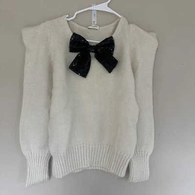 SUÉTER LAZO Saint Laurent en lana marfil y mohair y lentejuelas negras en crema Foto 1 de 4