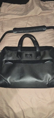 Bagagem de viagem Tumi preta CFX Shawnee fibra de carbono fina laptop breve  - Imagem 1 de 4