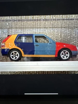 Matchbox RLC 1995 Harlequin VW Golf - CASI COMO NUEVO - SIN ABRIR - Exclusivo 2023 Sin usar, en caja Foto 1 de 4
