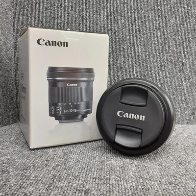 Lente Canon EF-S10-18 MM f 4,5-5,6 IS STM usada Foto 1 de 4
