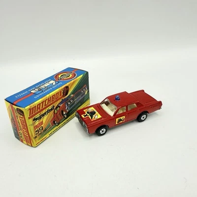 Matchbox Superfast 59 Mercury Fire Chief con casco y ejes etiquetas en caja  Foto 1 de 4