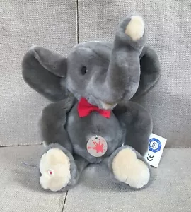 Elefante Sigikid en rojo pajarita cuerda cola peluche lindo raro Alemania - Imagen 1 de 8