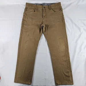 Pantalones de mezclilla IZOD para hombre elásticos calce regular cintura flexible marrón talla 36x32 LEER - Imagen 1 de 16