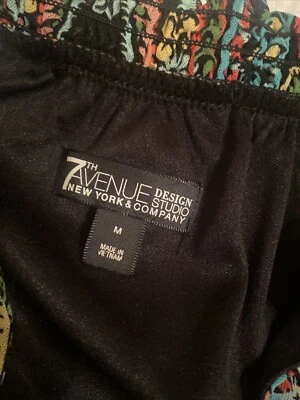 Top elegante de manga corta mediana para mujer Foto 1 de 4