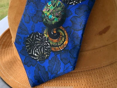 GORGEOUS CHRISTIAN LACROIX PARIS BLUE IRIDESCENT FLORAL ORBS 58” 3 7/8” FREESHIP - Image 1 of 4