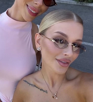 Gafas de sol Miu Miu con logotipo ovalado A54S lentes azules Foto 1 de 4