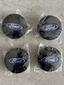 4 X Tapas centrales de llantas de aleación FORD 66mm negras FUSION FOCUS FIESTA MONDEO KUGA - Imagen 1 de 5