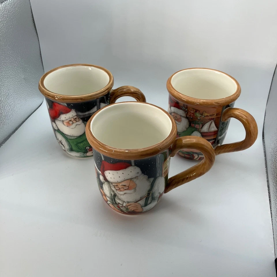 Certified International Susan Winget Santa Claus Mugs Set of 3 Christmas Ceramic - Image 1 of 4